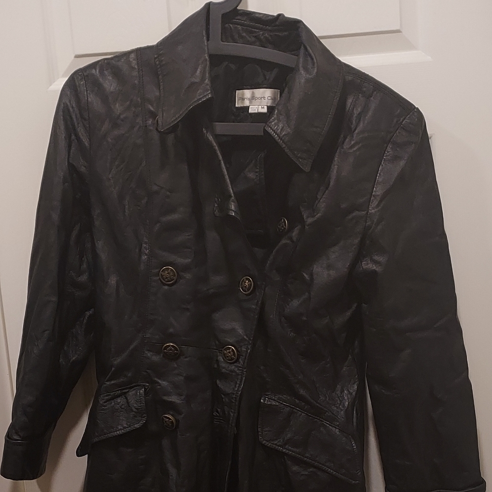 Woman black long leather jacket